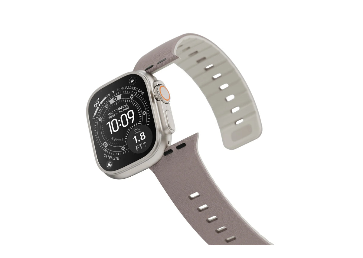 Apple Watch Ultra with Misty Grey & Starlight magnetic silicone strap shown from an angled side view