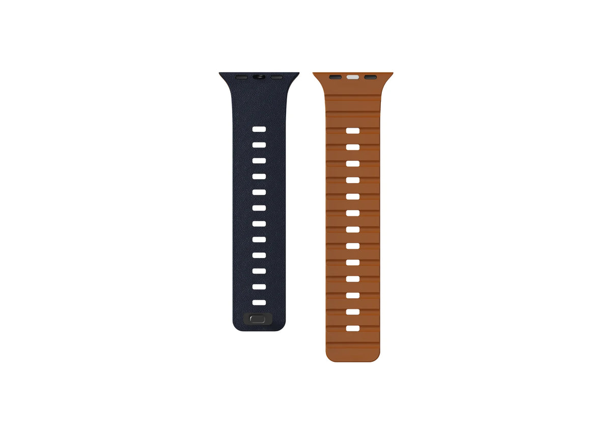 Navy blue magnetic Apple Watch band with contrasting brown silicone interior, adjustable perforations and integrated magnetic pin closure