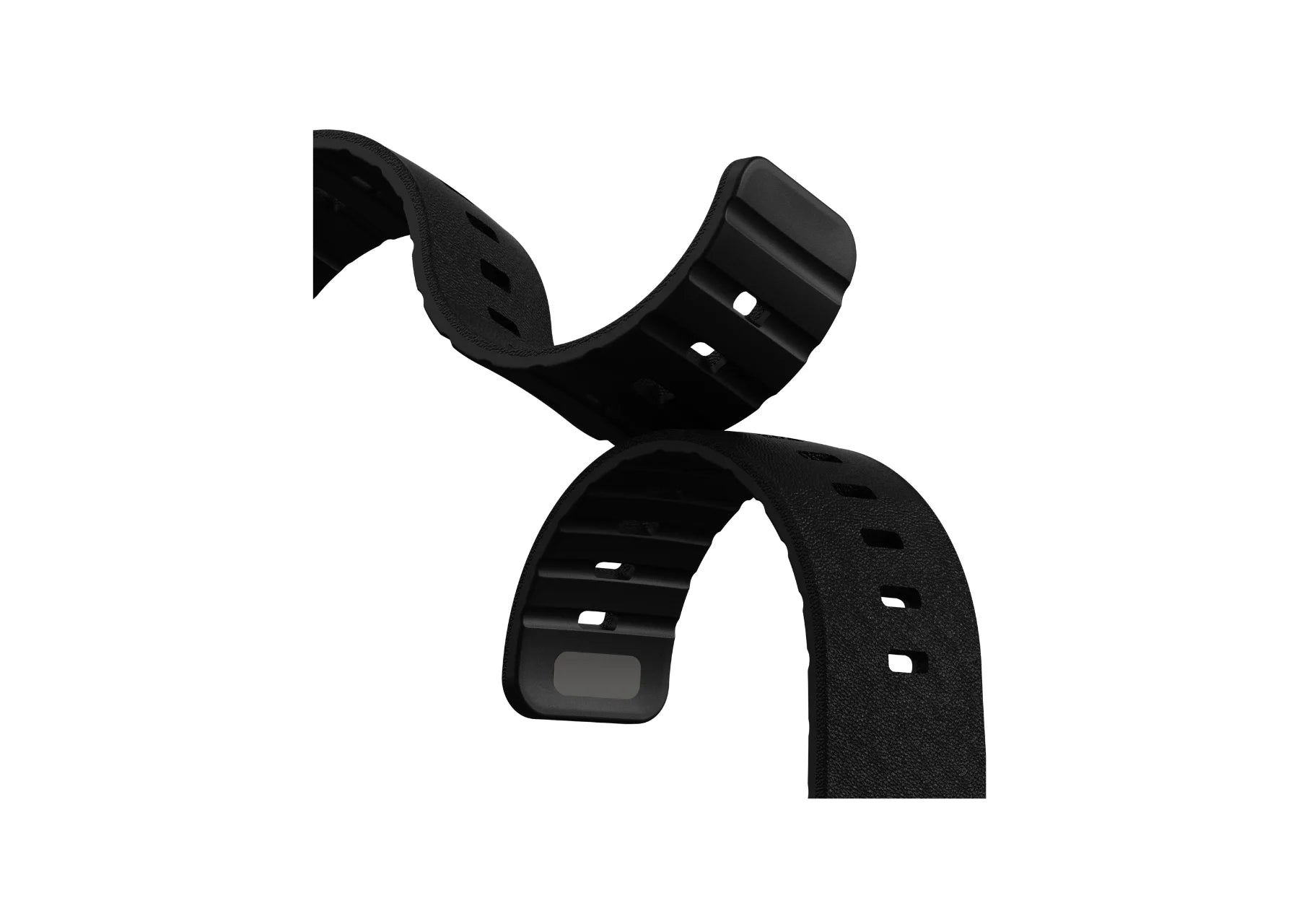 Close-up of black Apple Watch strap showing textured silicone surface, adjustment holes and magnetic fastening