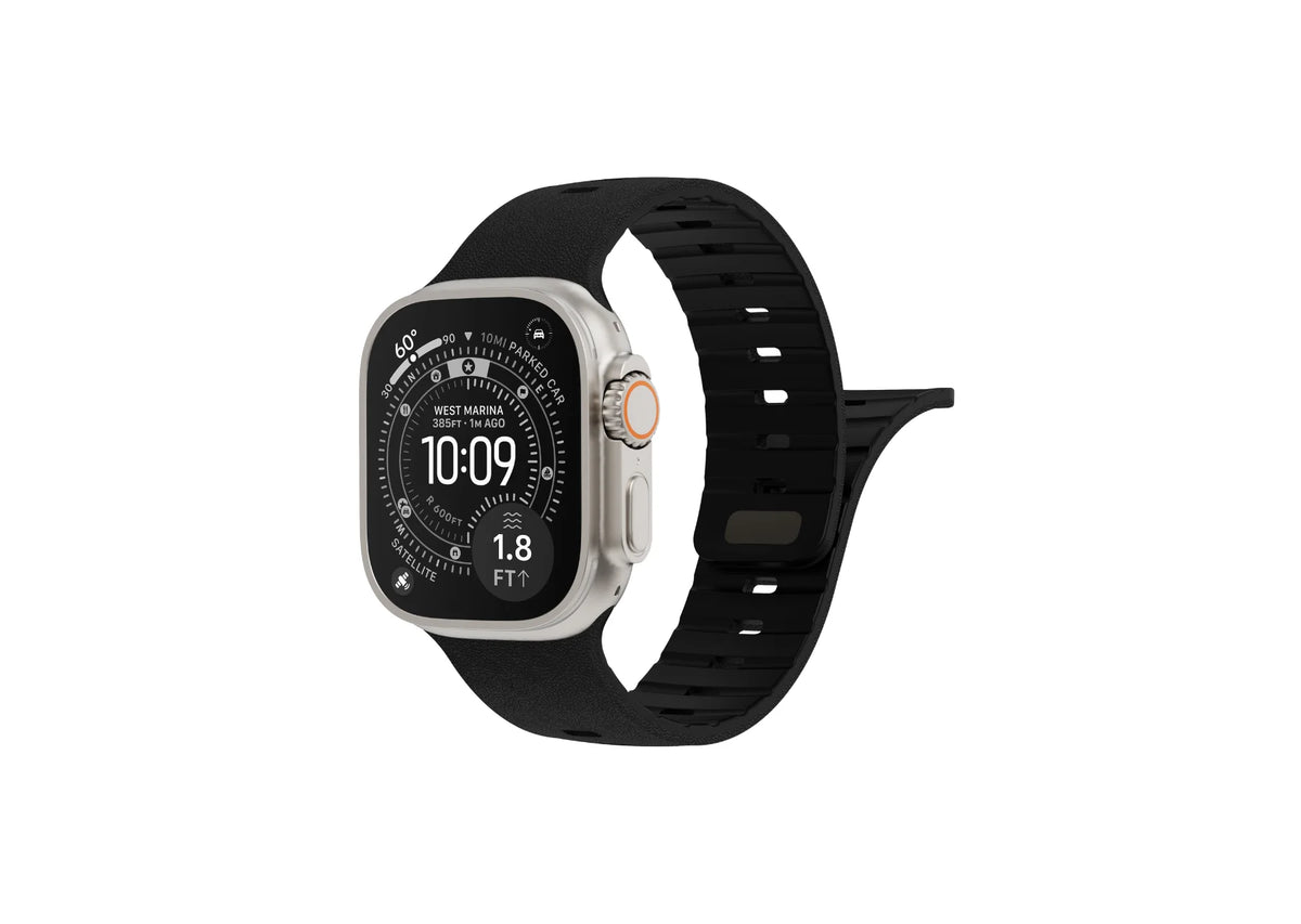 Apple Watch Ultra with black textured silicone strap shown from the rear with adjustable magnetic fastening