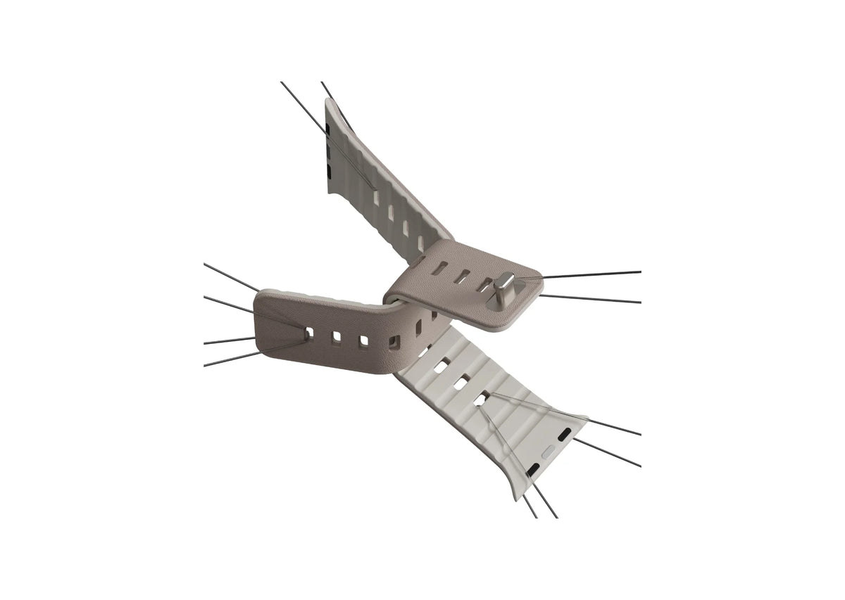 Full-length view of the Misty Grey & Starlight Apple Watch strap with textured exterior and magnetic fastening