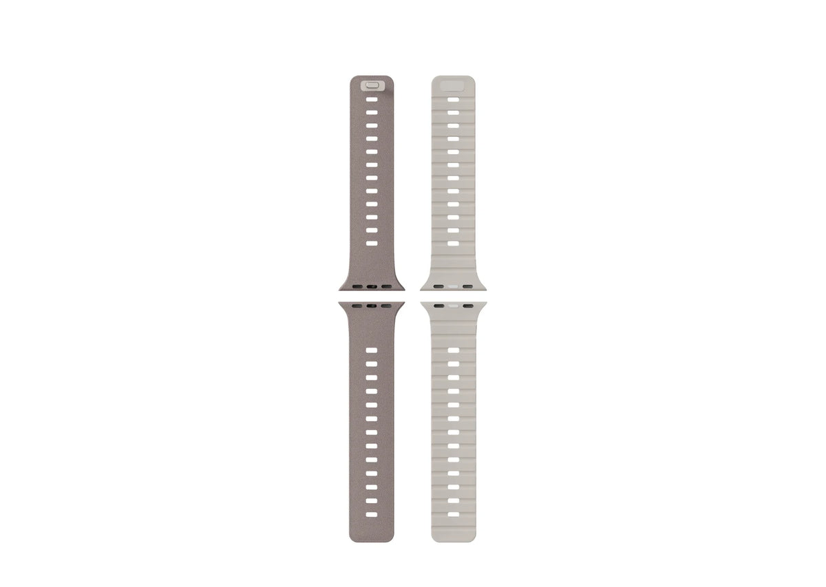 Misty Grey & Starlight Apple Watch strap showing the magnetic closure, adjustment holes and Starlight inner surface